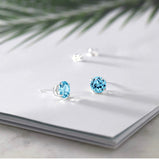 2.50 ctw Swiss Blue Topaz Stud Earrings In 14K White Gold